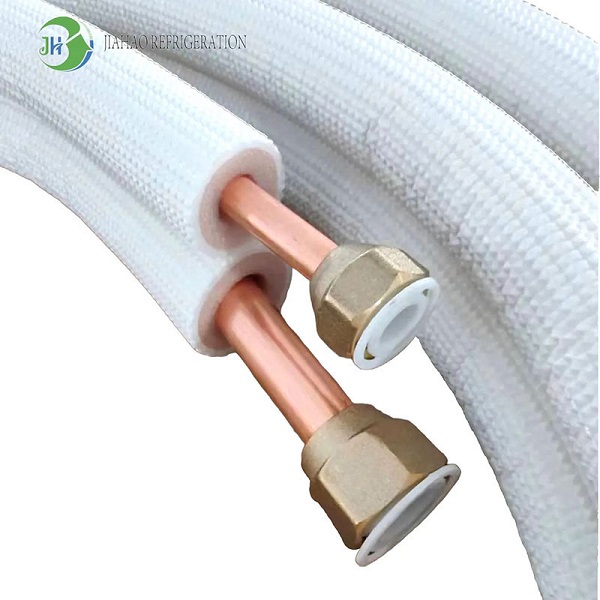 AC copper pipe coupling joining two sections of insulated suction line for an extended line set